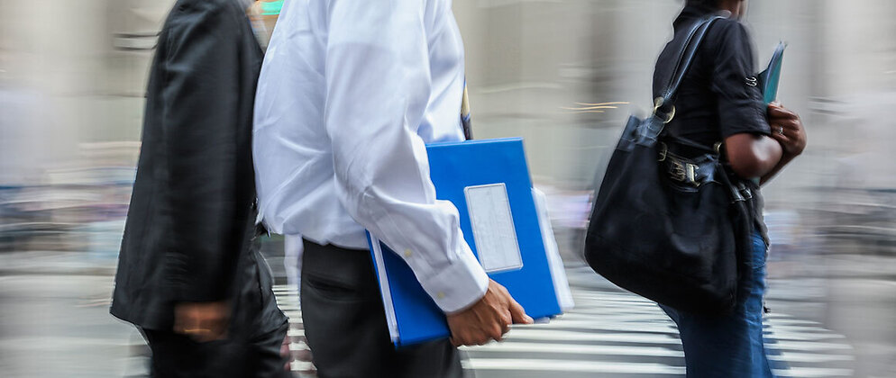 Business people walking with files